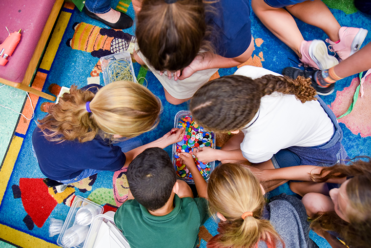 Kids choosing coloful buttons